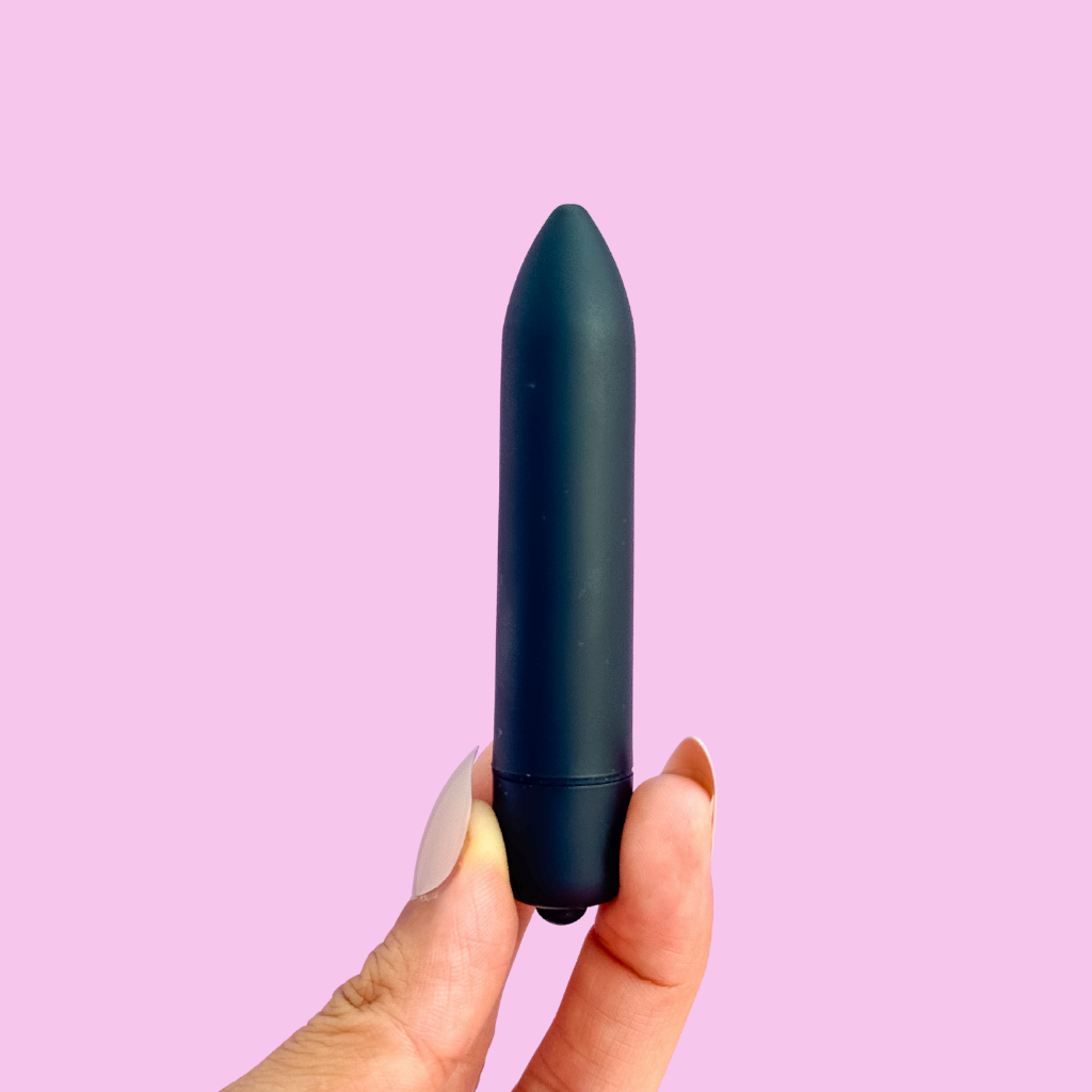 Discreet portable black bullet vibrator for versatile external pleasure.