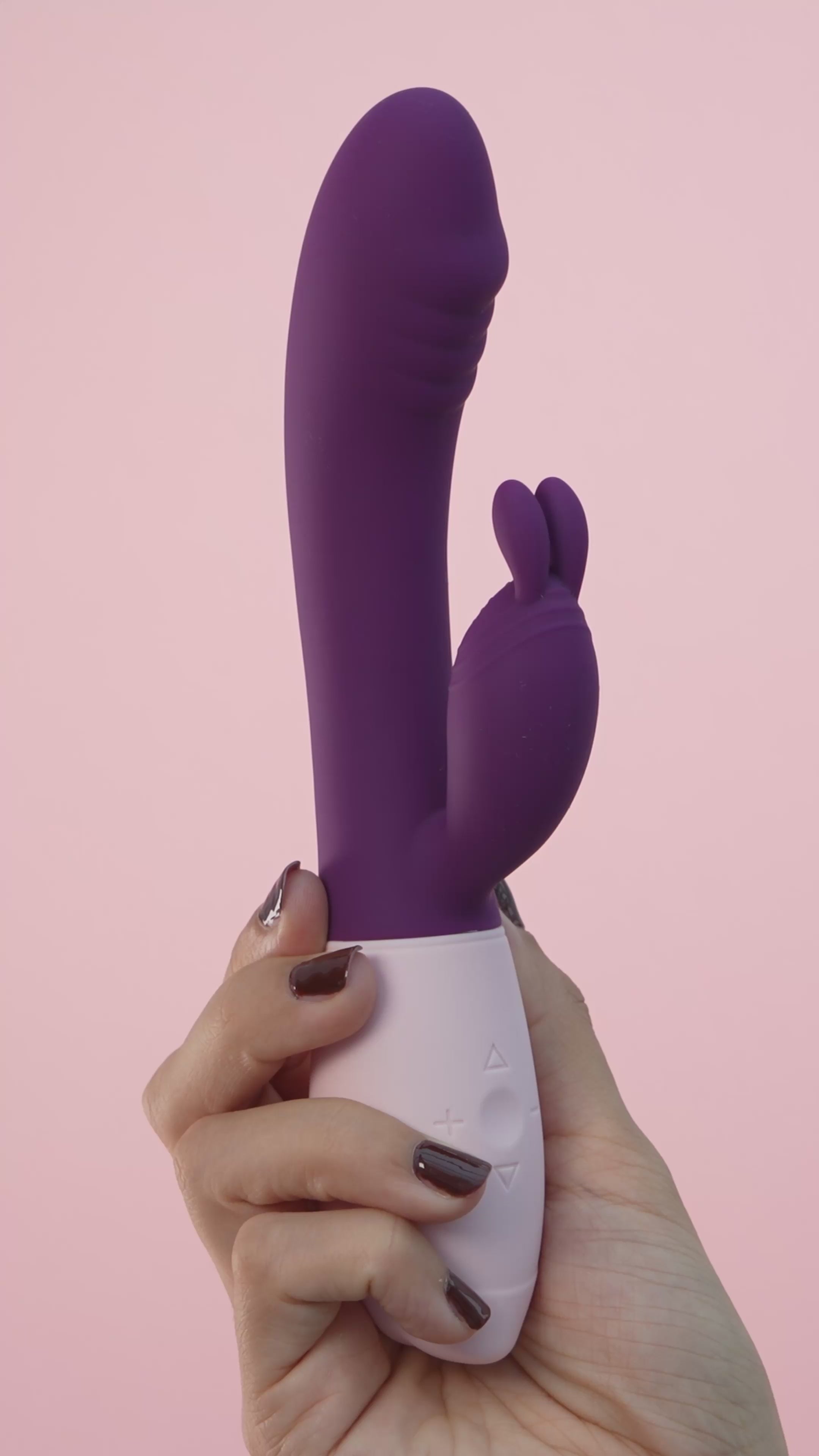 Load video: Rabbit vibrator product video female massager in purple. 