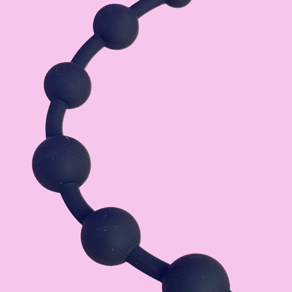Waterproof black anal beads for males and females.